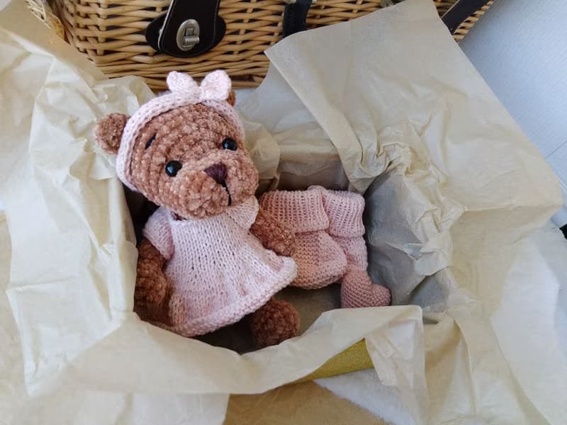 Teddy bear and booties baby gift for mom.Teddy bear in a pink dress pink shoes