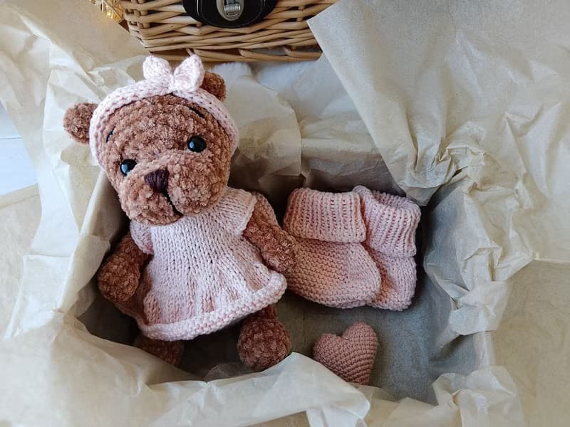 Teddy bear and booties baby gift for mom.Teddy bear in a pink dress pink shoes