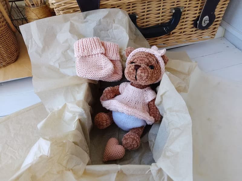 Teddy bear and booties baby gift for mom.Teddy bear in a pink dress pink shoes
