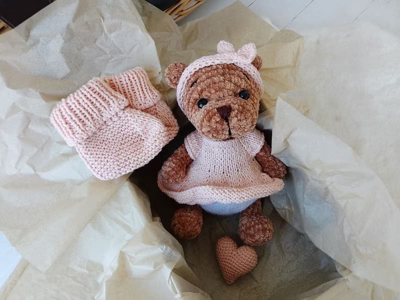 Teddy bear and booties baby gift for mom.Teddy bear in a pink dress pink shoes