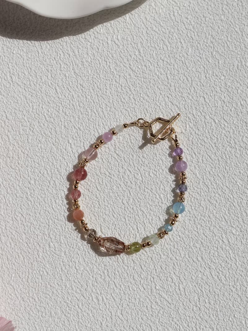 晴天娃娃。不規則黑金超七 草莓晶 星光粉晶 14K包金 水晶手鍊