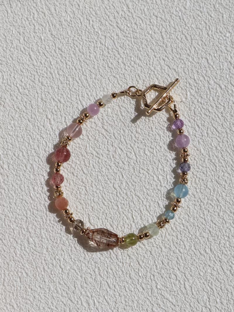 晴天娃娃。不規則黑金超七 草莓晶 星光粉晶 14K包金 水晶手鍊