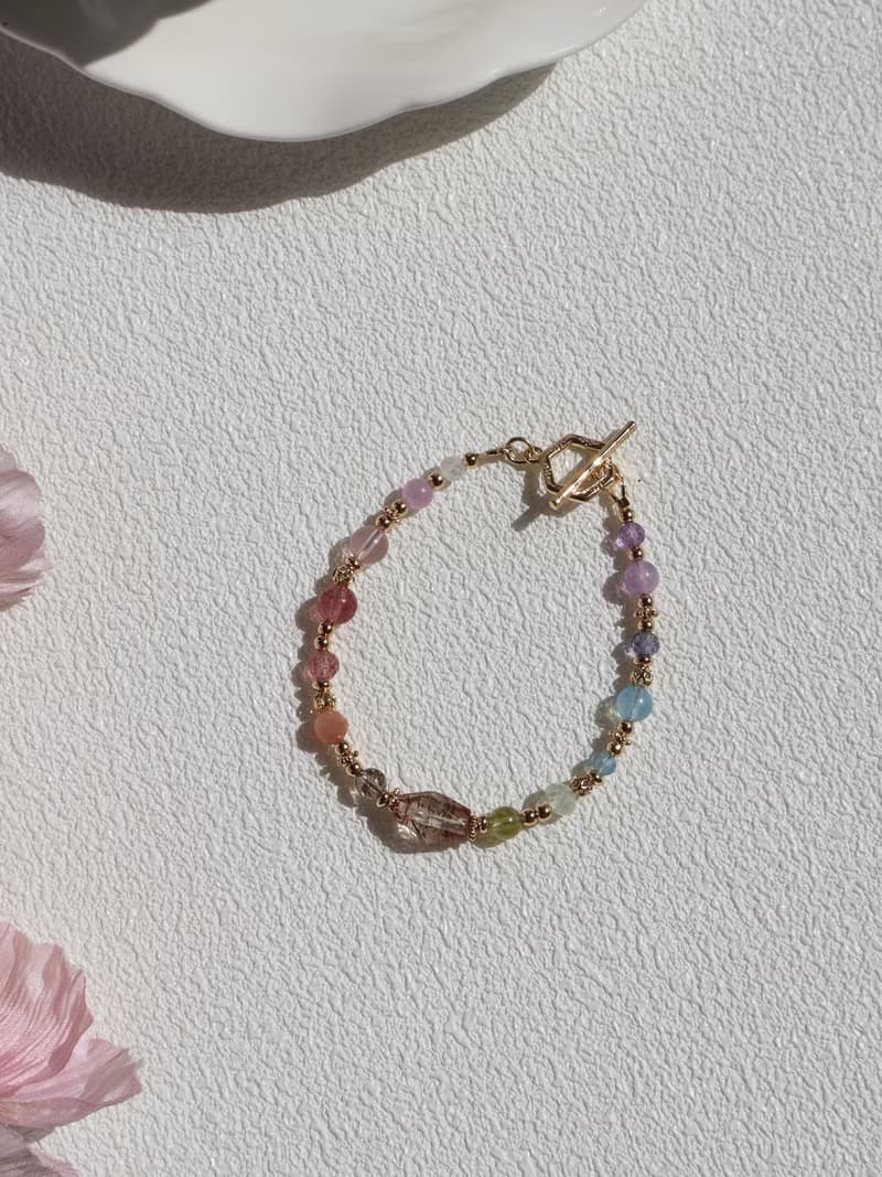 晴天娃娃。不規則黑金超七 草莓晶 星光粉晶 14K包金 水晶手鍊