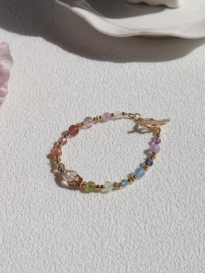 晴天娃娃。不規則黑金超七 草莓晶 星光粉晶 14K包金 水晶手鍊