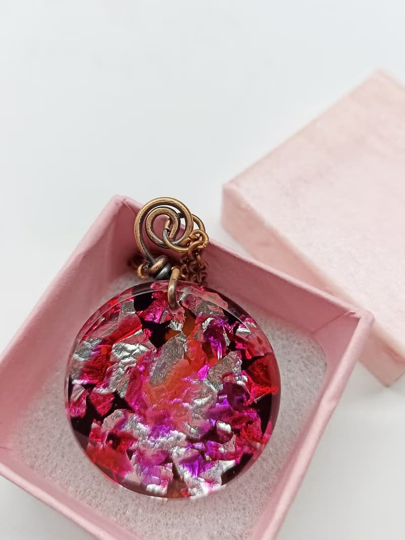 Pink resin pendant necklace inspired by Murano glass