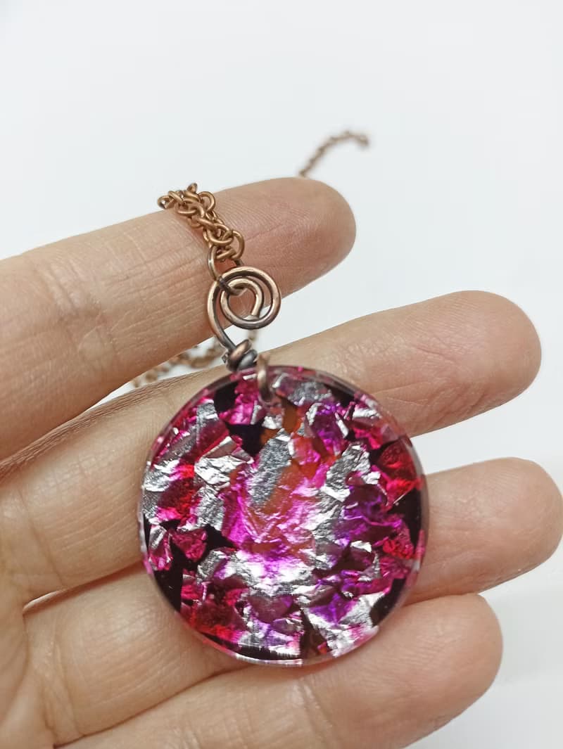 Pink resin pendant necklace inspired by Murano glass