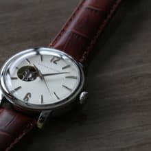 鏤空機械腕錶 - 噴沙銀面配啡帶