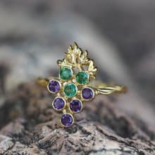 14k  gold ring with emeralds and amethysts.