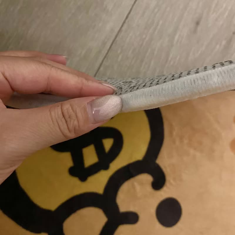 小橘貓咬錢來地墊