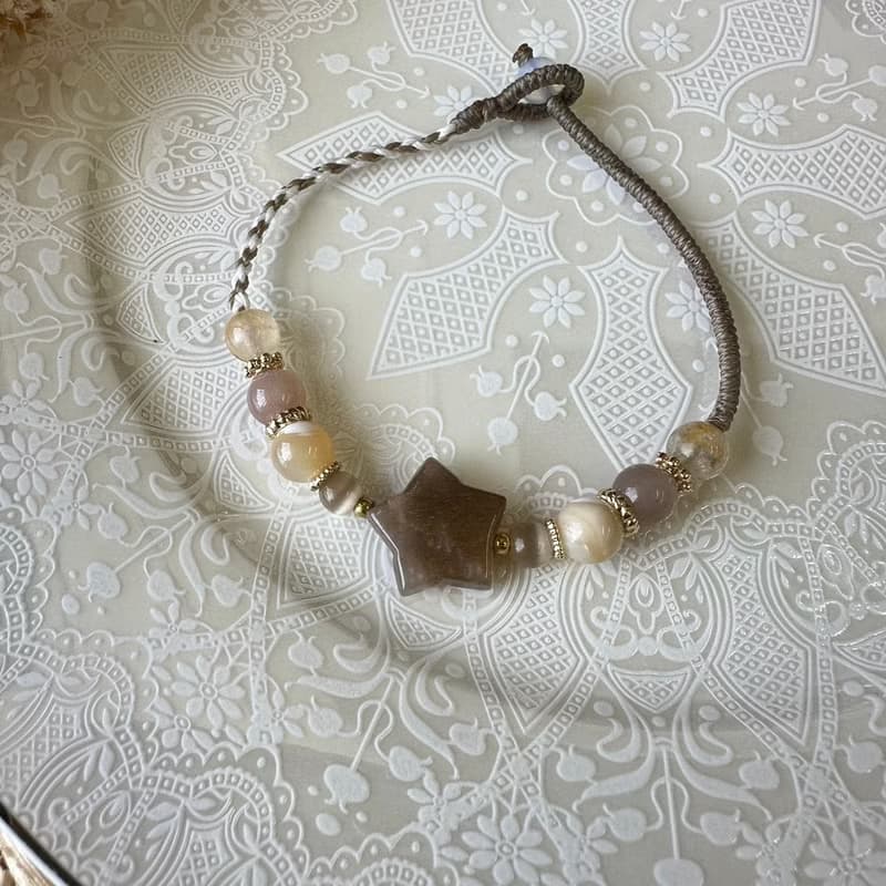 奶茶色系骨幹石星星編織手鍊