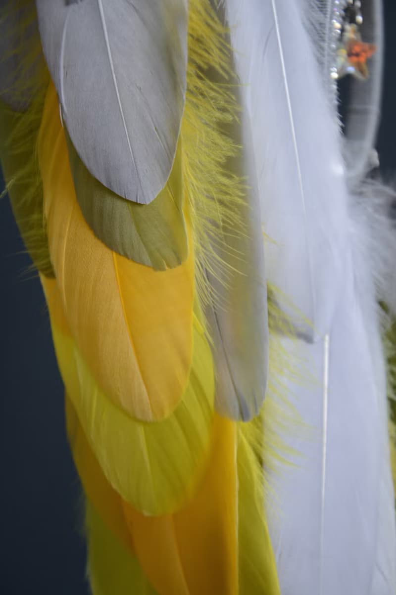 Handcrafted Dream Catcher with Sparkling Crystals and Vibrant Yellow Feathers
