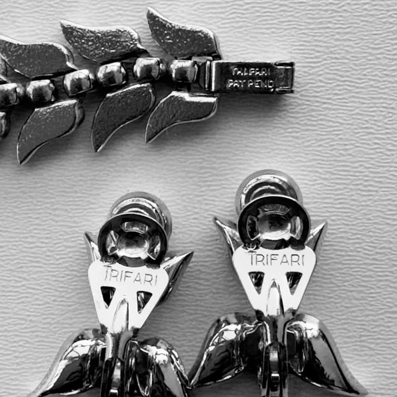 Vintage Crown Trifari set clipon earrings and bracelet silver tone 1950 patent