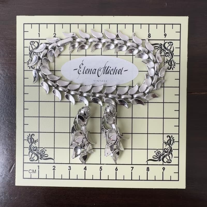 Vintage Crown Trifari set clipon earrings and bracelet silver tone 1950 patent