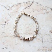 Journal-雙結之心 (銀光橙月光石)自留款蝴蝶結愛心925銀鍍金手鍊