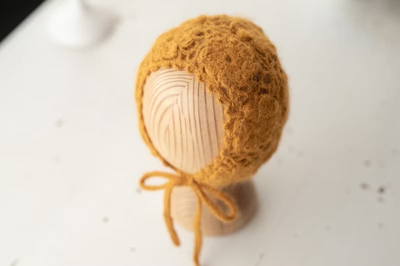 Orange hat for newborn girls:the perfect outfit for a little girl