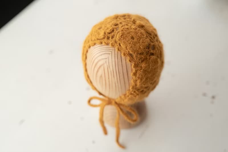 Orange hat for newborn girls:the perfect outfit for a little girl