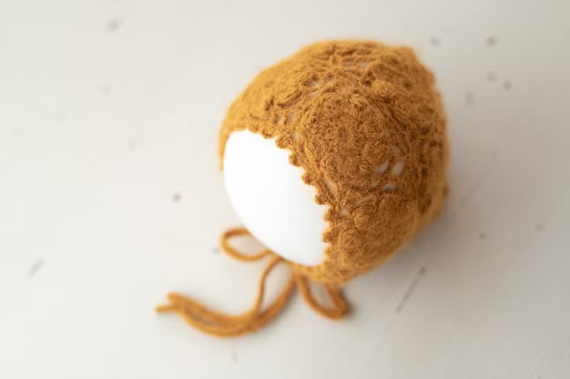 Orange hat for newborn girls:the perfect outfit for a little girl