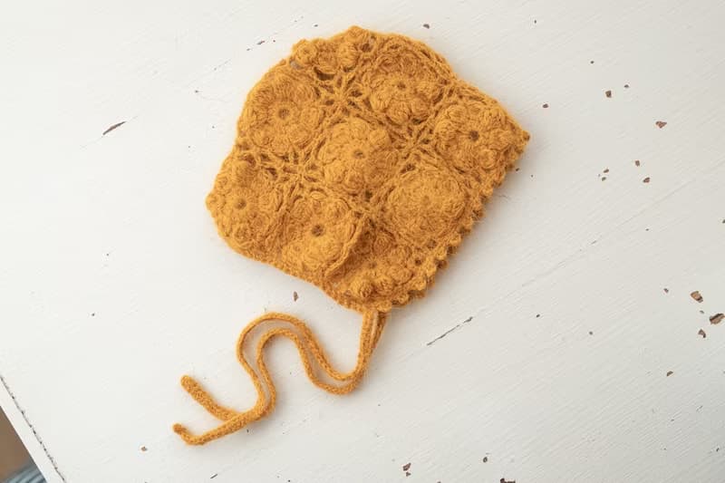 Orange hat for newborn girls:the perfect outfit for a little girl