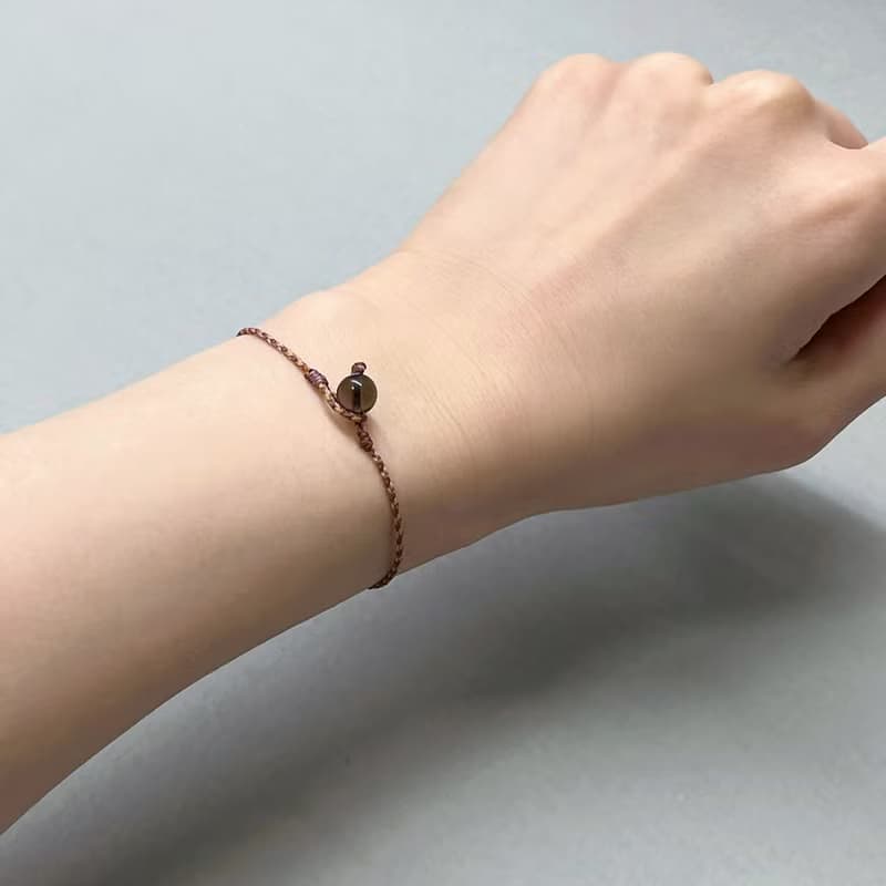 茶晶四股編超細蠟線編織手環(咖+米黃)