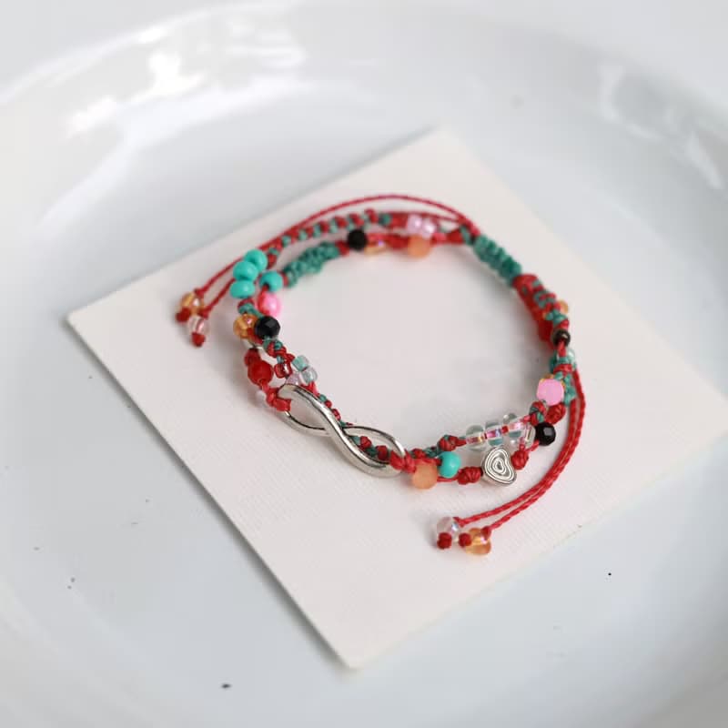 Infinity mint pink woven waxed cord double layered bracelet