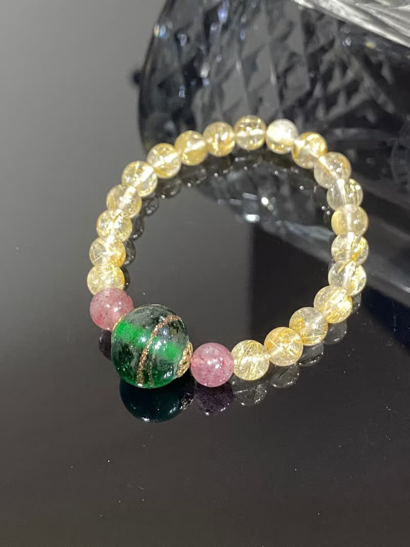 發財髮晶鈦金草莓晶老琉璃手串