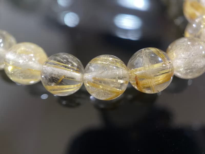 發財髮晶鈦金草莓晶老琉璃手串