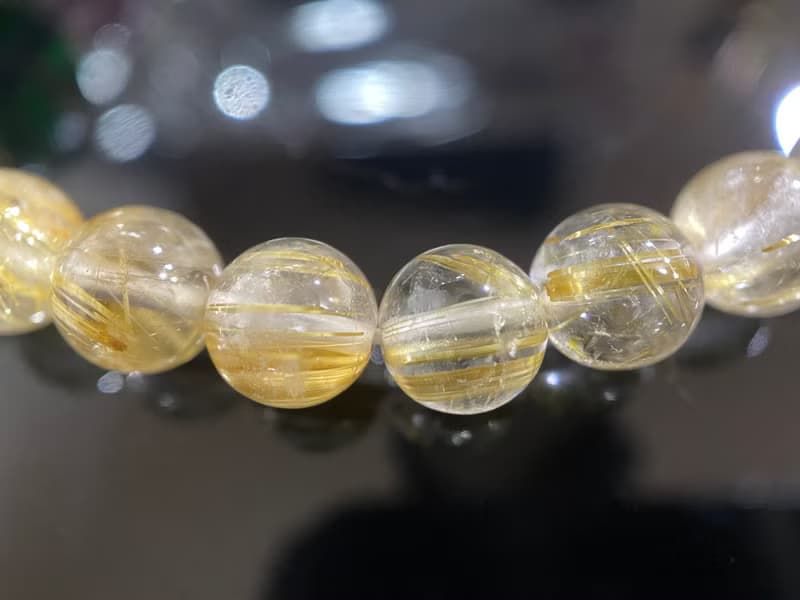 發財髮晶鈦金草莓晶老琉璃手串