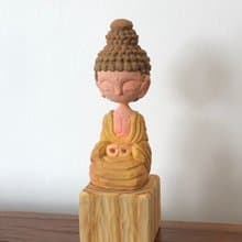 Wooden peaceful Buddha