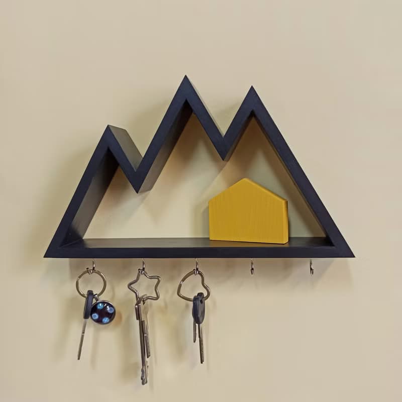 Wall key holder mini shelf in the shape of a mountains, with different tops