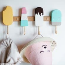 Clothes and towel hanger for nursery with wooden ice cream hooks