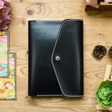 A5仿皮革筆記本。純手工復古手拿包書衣。黑色