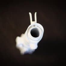 White wedding bouquet holder inspired by Luke's lightsaber hilt