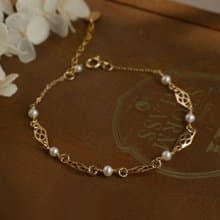 日光窗花 14kgf 天然珍珠鏤空手鍊