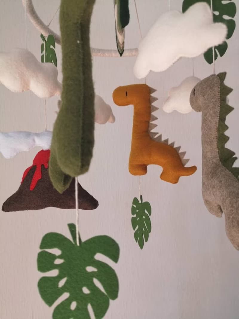 Dinosaur crib baby mobile with rainbow cloud star monstera. Baby shower gift ide