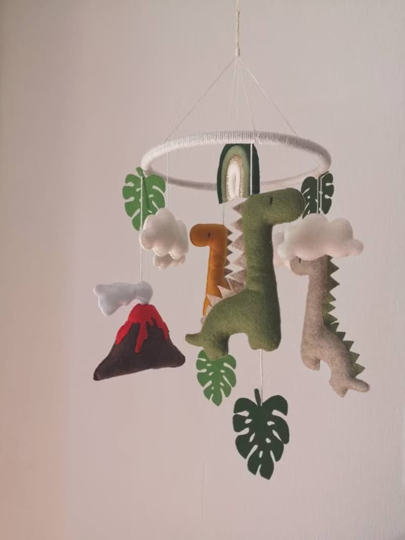 Dinosaur crib baby mobile with rainbow cloud star monstera. Baby shower gift ide