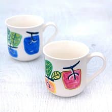 ローズピンクの柿模様のマグカップ