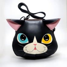 Black cat crossbody bag is compact fro carrying mobile phones.
