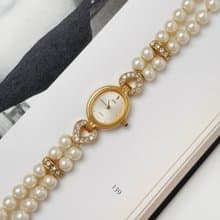Avon Gold Tone With Faux Pearl Bracelet Watch