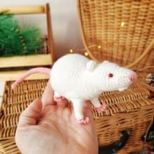 Soft toy life-size white rat with red eyes. White mouse toy.