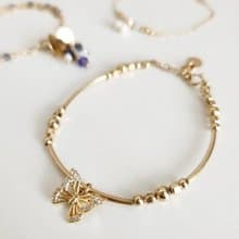 花燦蝶舞 - 金珠蝶舞彎管手鍊