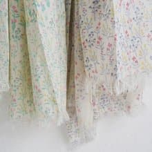 アンティーク缶をイメージした柄とふんわりやさしい素材感、garlamdコットンウールストール