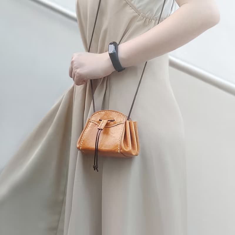 MICO 牛皮革真皮束口小手袋/餃子包/單肩包/收納包