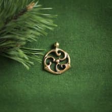 Triskele pendant on leather cord. Triskelion necklace. Celtic jewelry. Pagan Art