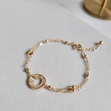 微笑曙光 - 簍空鋯石金珠手鍊