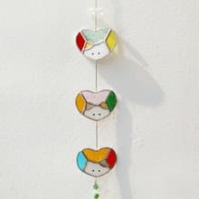 stained glass suncatcher featuring a cat inside a heart