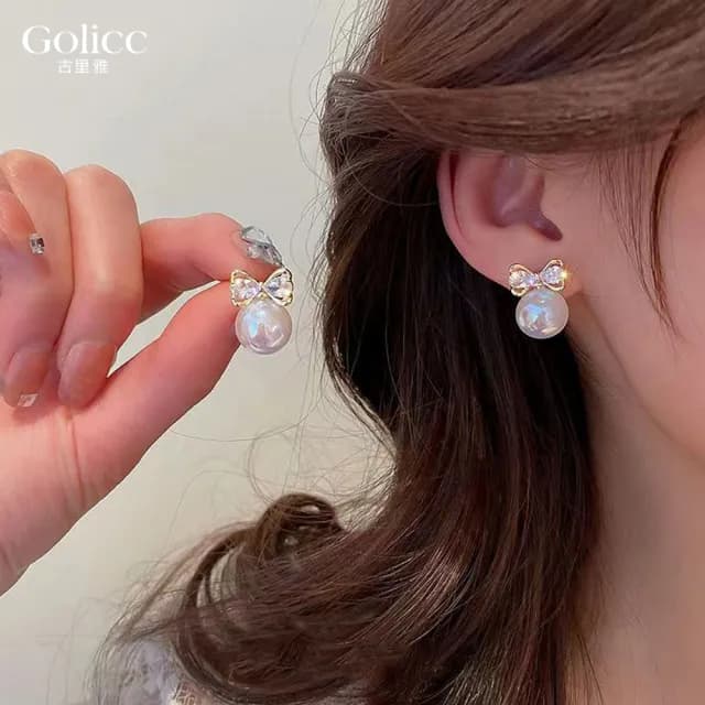 【Golicc】耳環 蝴蝶結 珍珠(99購物限定 生日 飾品 耳釘 耳飾 耳墜 禮物)