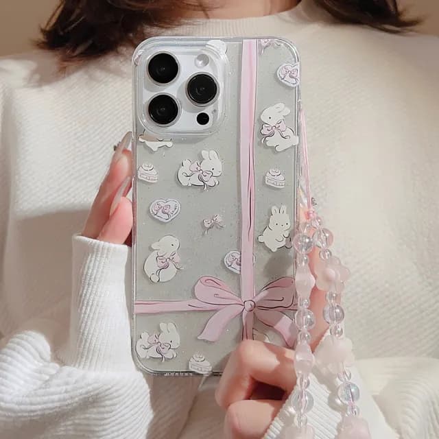 【LOYALTY】iPhone15Pro/15ProMax禮物蝴蝶結可愛兔兔串珠掛繩手機保護殼(附贈花朵串珠手機掛飾)