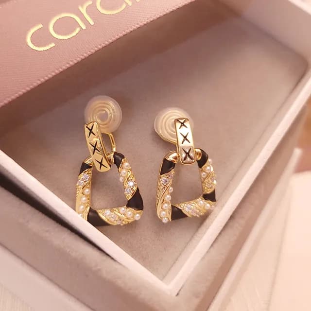 【焦糖小姐 Ms caramelo】夾式時尚耳環(貝珠鋯石耳環)