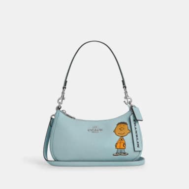 【COACH】蔻馳官方直營 COACH X PEANUTS TERI FRANKLIN圖案單肩手袋-SV/淺藍色 混合色(CBJ80)