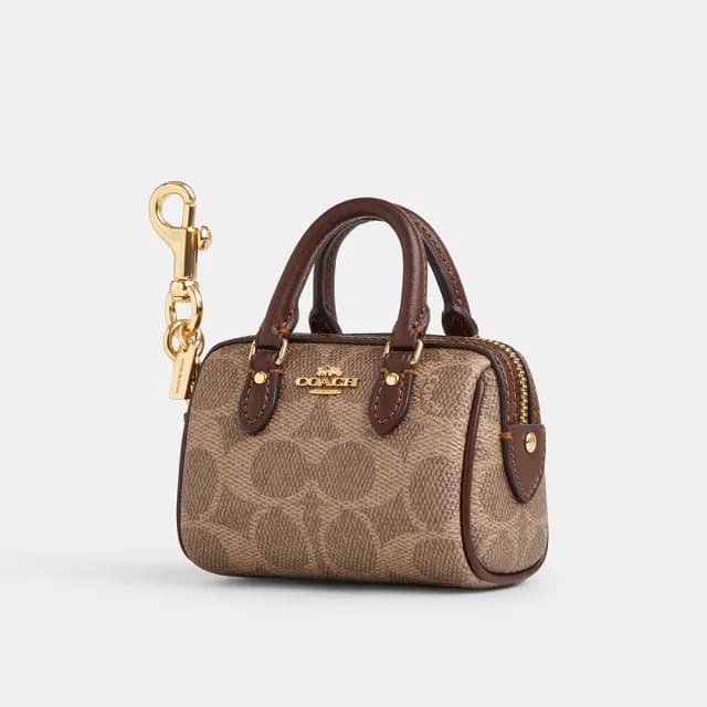 【COACH】蔻馳官方直營 ROWAN經典Logo迷你手袋掛件-IM/棕黃色/棕色(CX068)